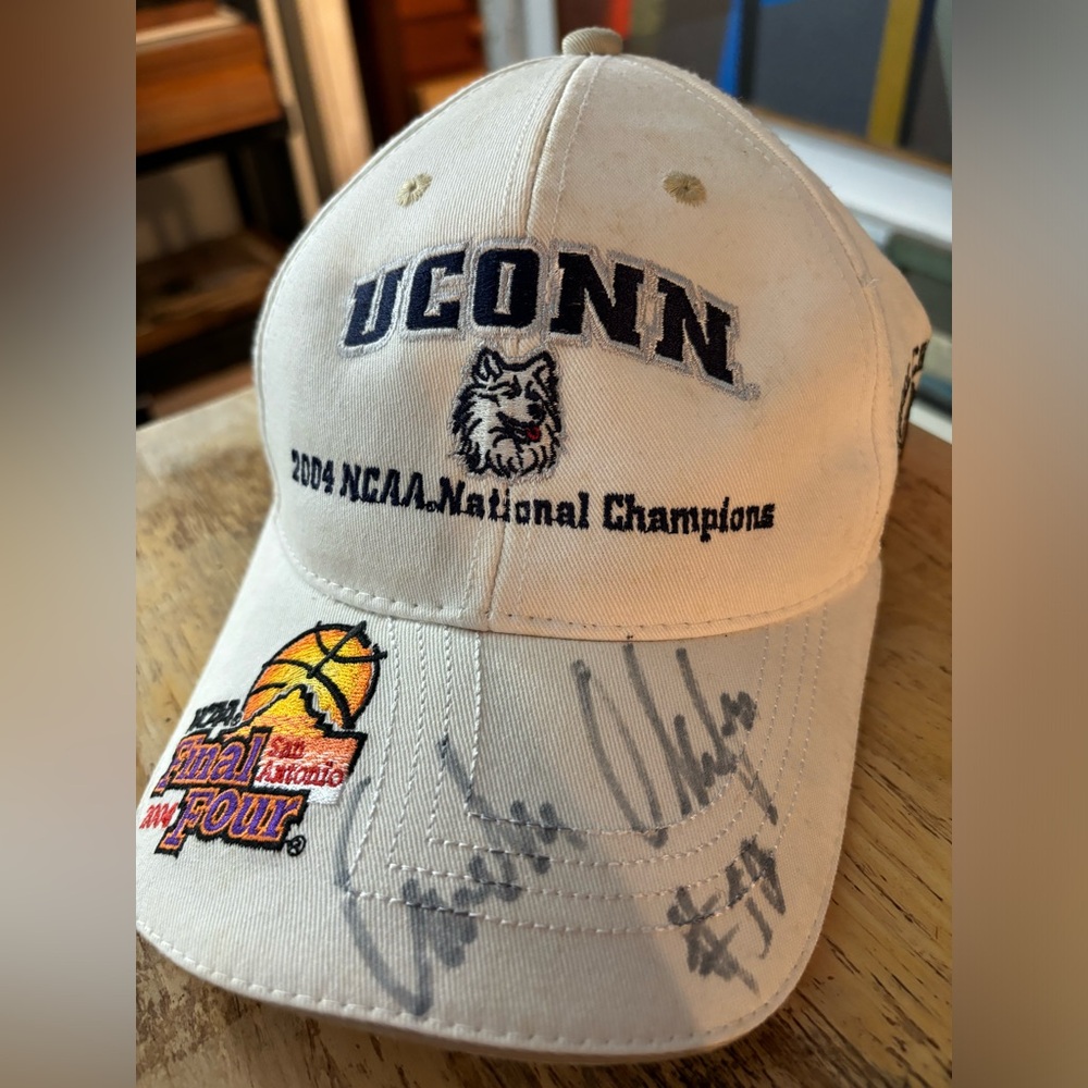 UConn Men’s NCAA 2004 Championship Hat. Signed by Emeka Okafor.